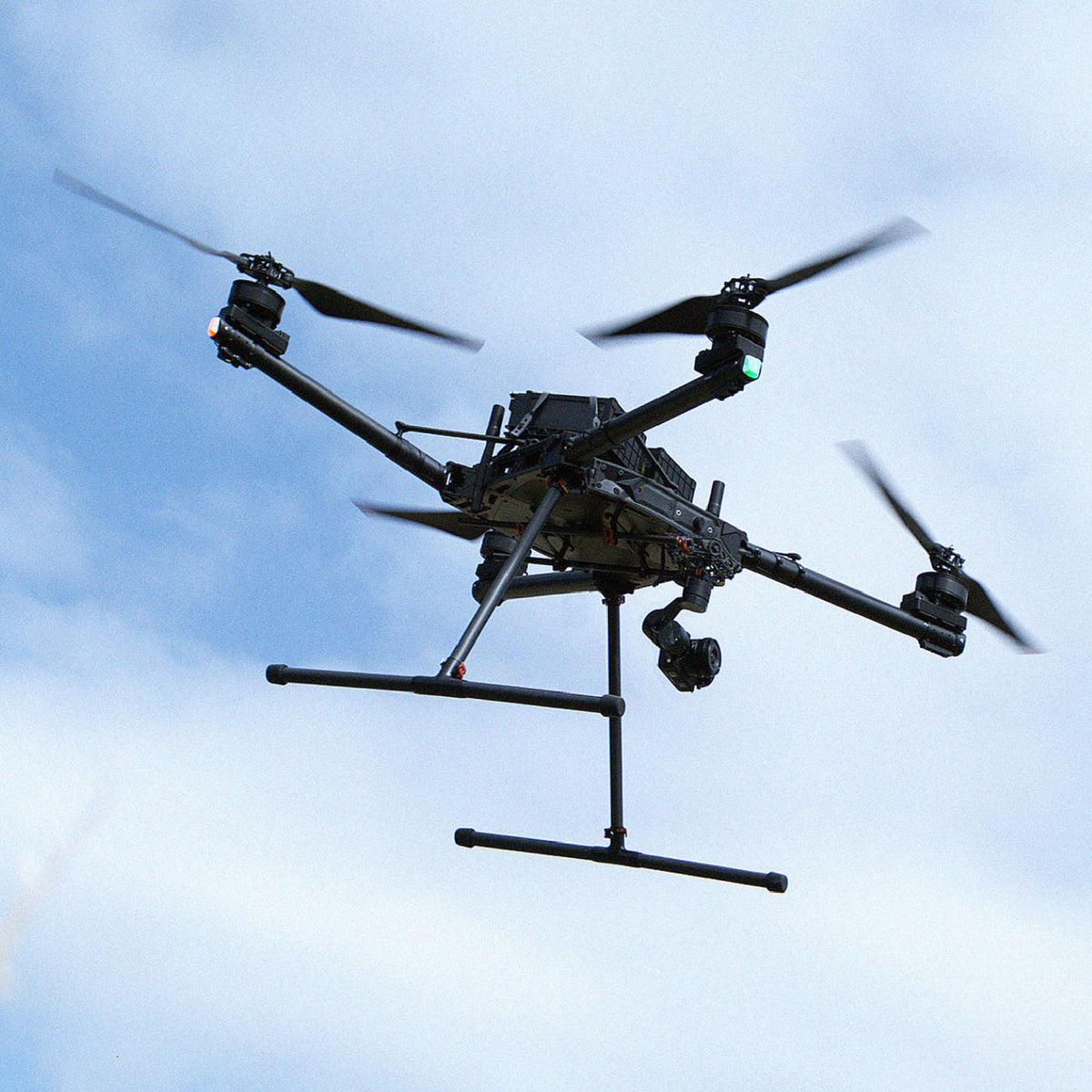 Freefly Alta X Gen2 heavy-lift enterprise drone flying over a field